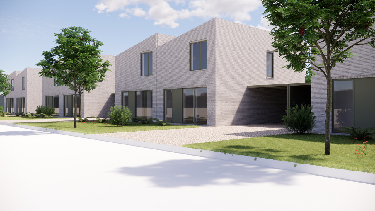 Moderne leefruimte met grote raampartij en veel natuurlijk licht